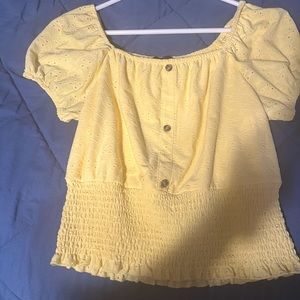 Yellow top. Puffy sleeves. Worn once